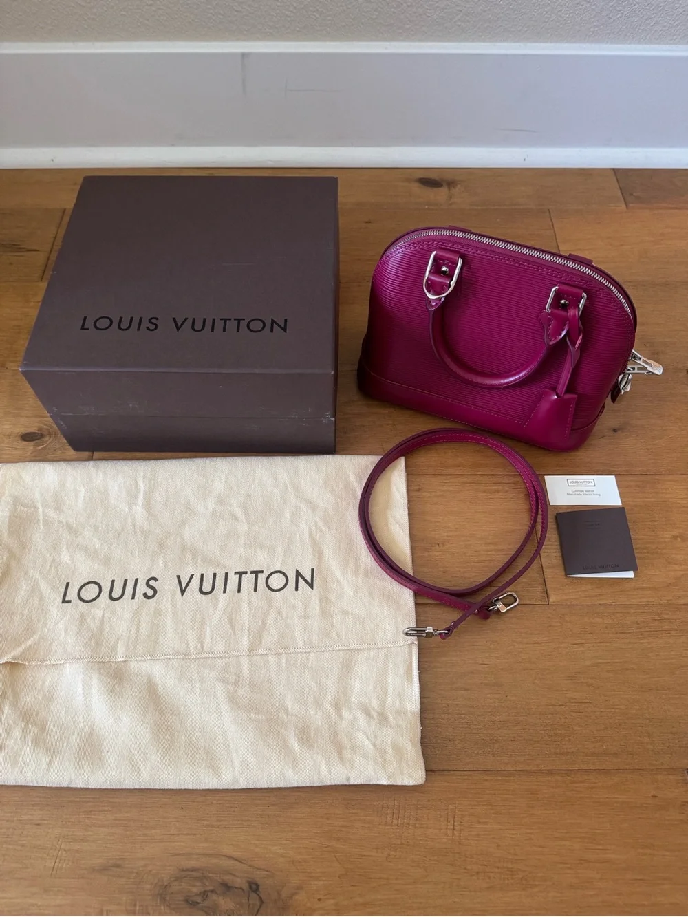 Louis Vuitton Alma BB Epi Leather Satchel in Fuchsia - Picture 2 of 10